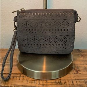 NWOT Maurices gray laser cut wristlet.